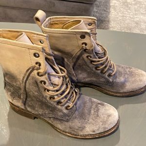 Frye combat boots.